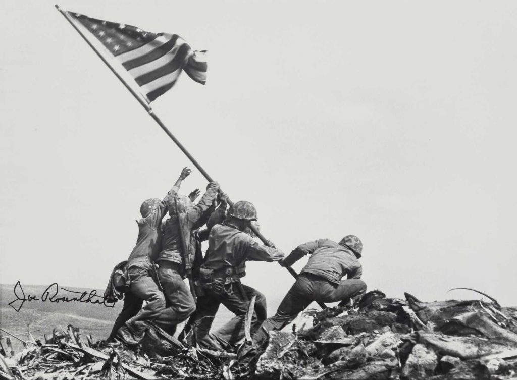 The Raising of the US Flag on Mt. Suribachi Iwo Jima.