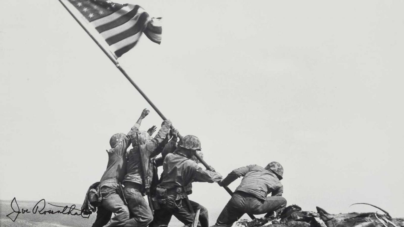 The Raising of the US Flag on Mt. Suribachi Iwo Jima.